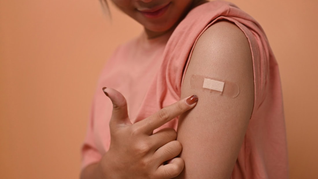 Skin prick vaccination on the arm for travel and vaccinations, healthcare, vaccination process.